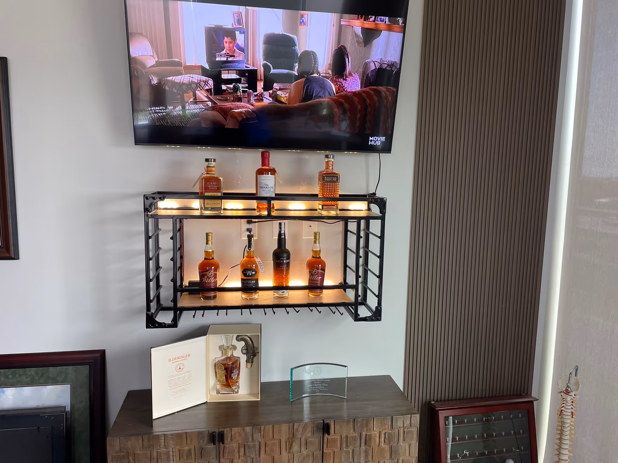 TV mounted above a fireplace by A-Breasy